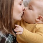 New Home Gifts - A Mother Kissing Her Baby