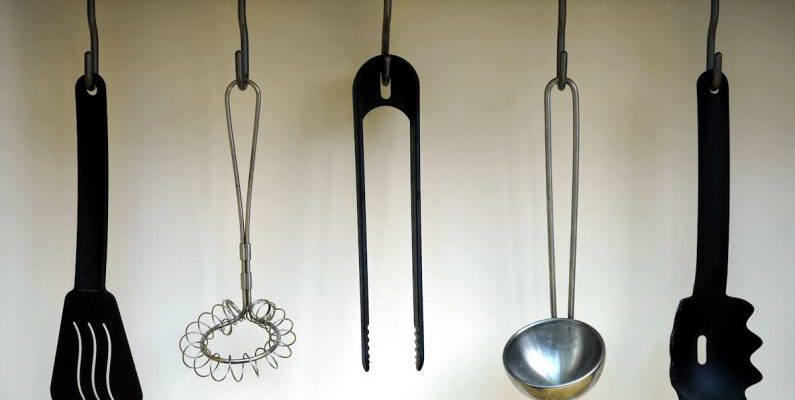 Kitchenware - Black Plastic Spatula Hanged on Black Hook