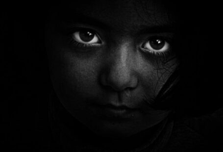 Hidden Costs - Grayscale Photography of Girl's Face